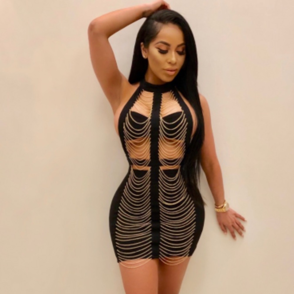 Sexy Black dress with gold chains on front